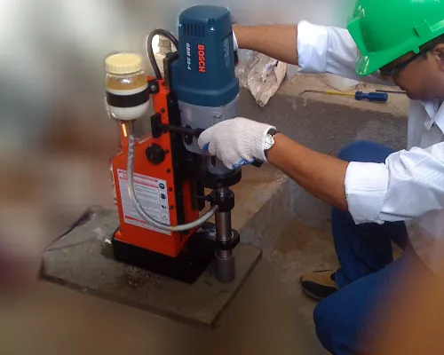 A magnetic drill at work on site